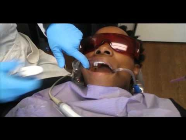 Dr. Mariam removes original material from tooth